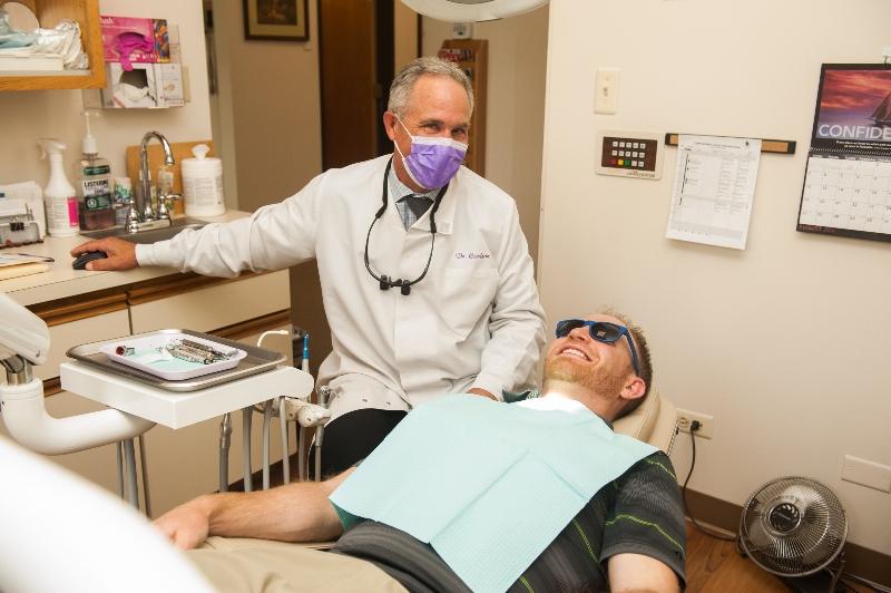 Dr. Carlson and smiling patient