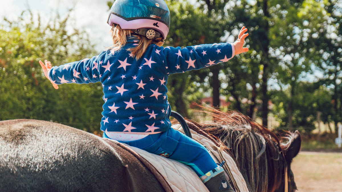 Photo of horseback riding for kids