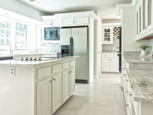 clean kitchen with clean tile floors