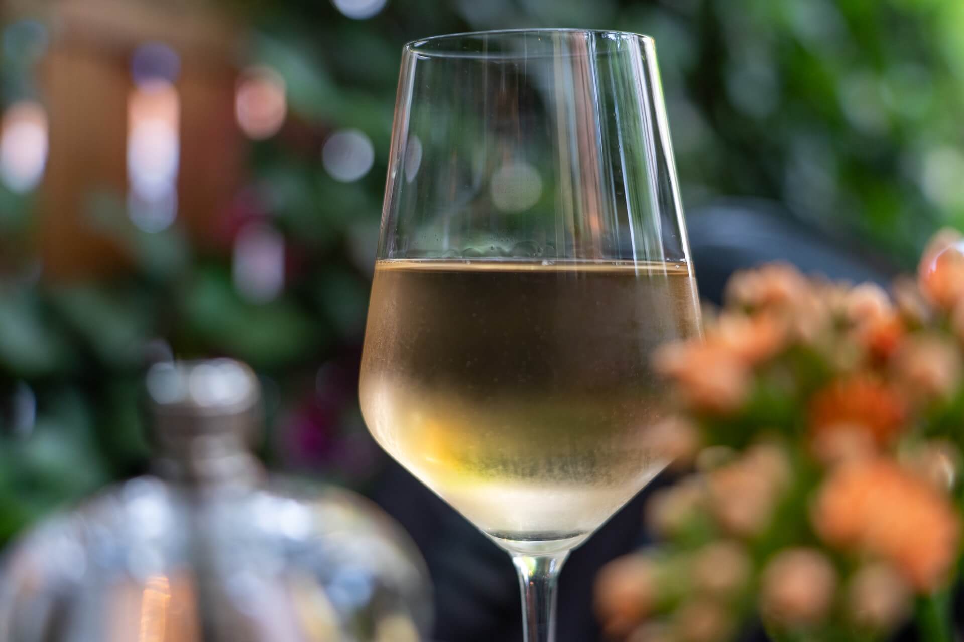 white wine in a glass to remove carpet stain