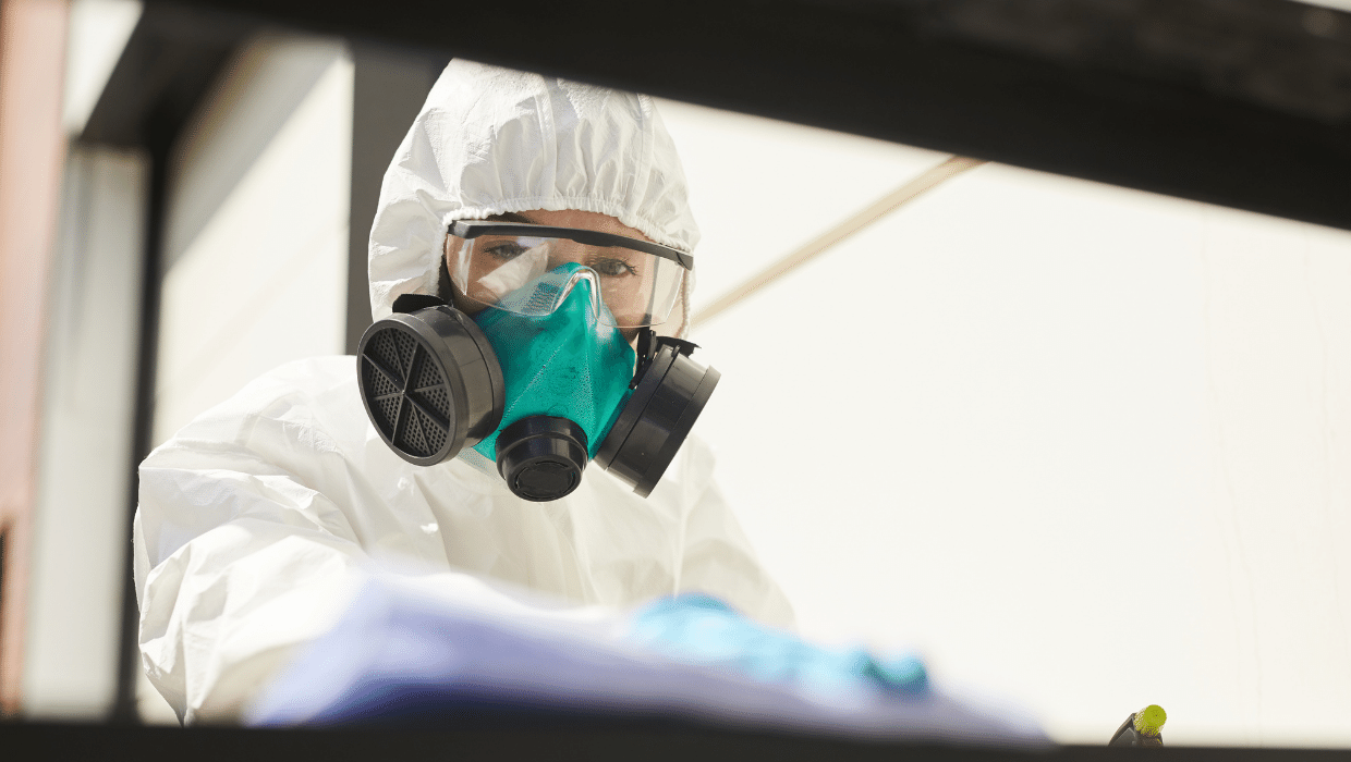 a trauma cleaner in a hazmat suit