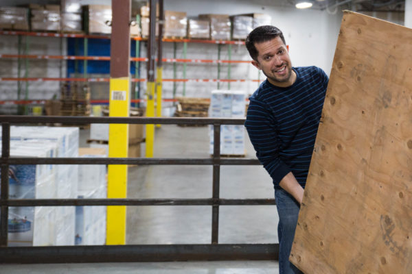 Gustavo Albino works to unload pallets of product into the Spreetail fulfillment center in Lincoln, NE. All new employees complete fulfillment training within their first months at Spreetail.