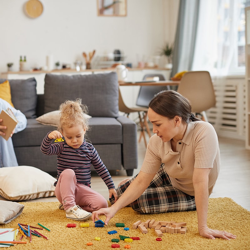 Mom playing with her daughter
