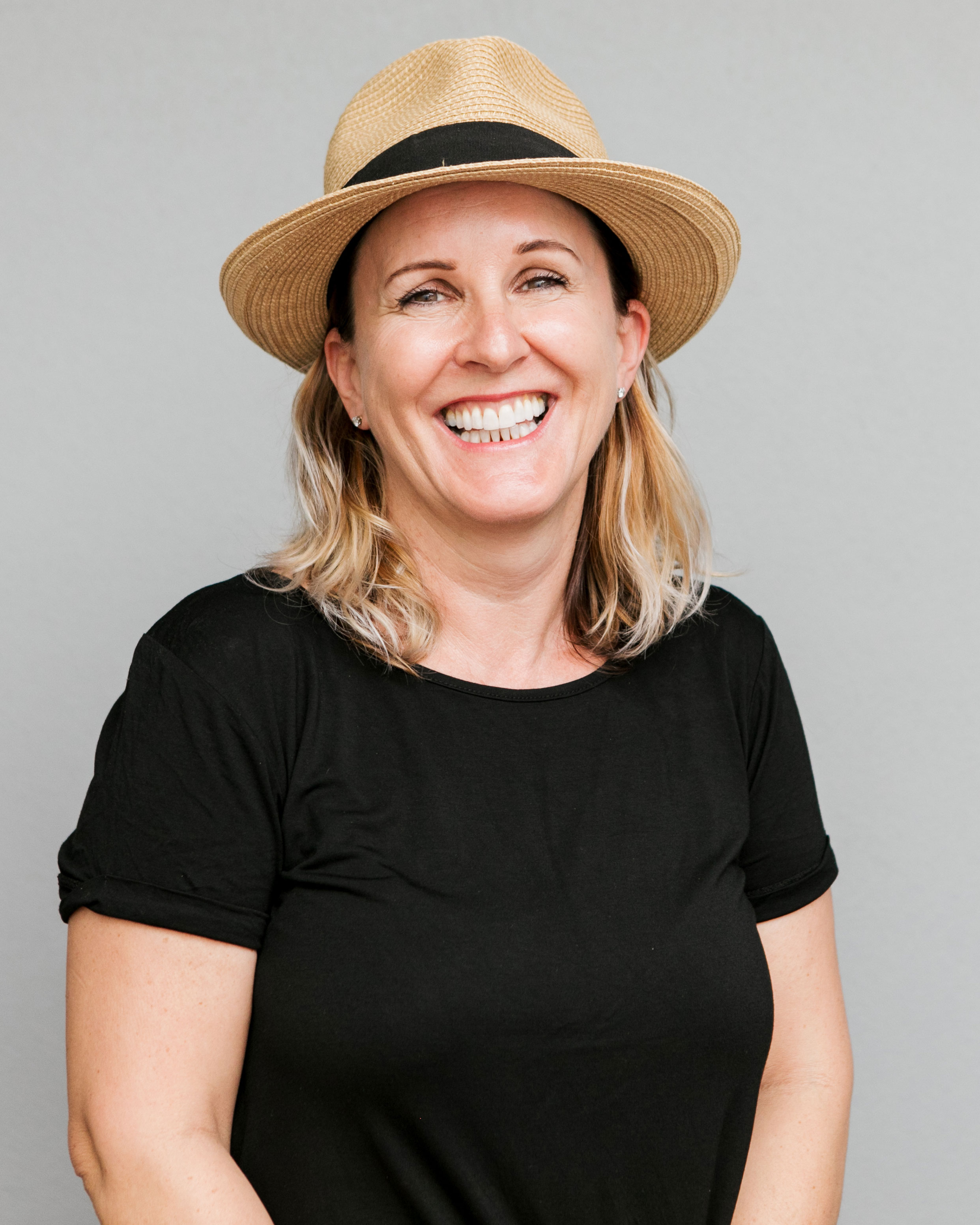 Smiling woman in a hat