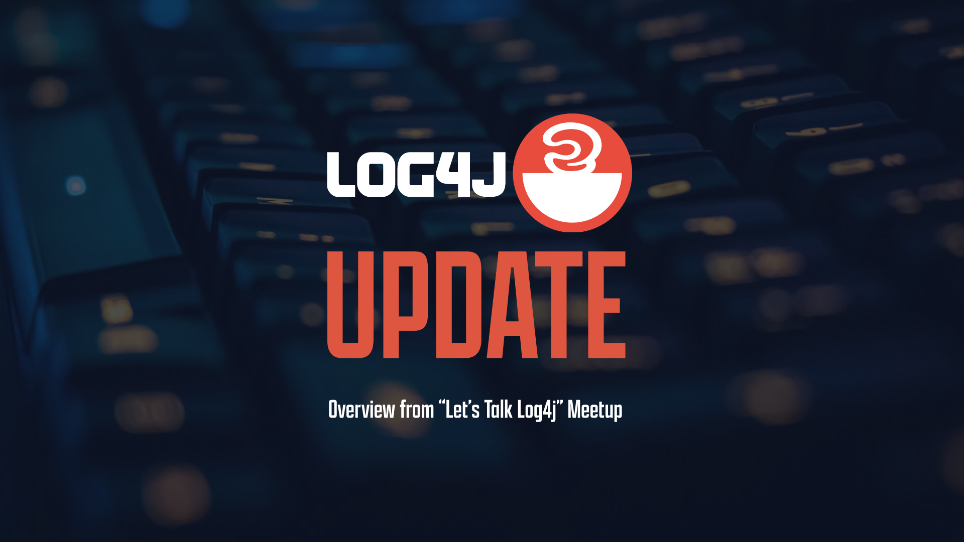 Close up of a computer keyboard with white and red text saying "Log4j Update"