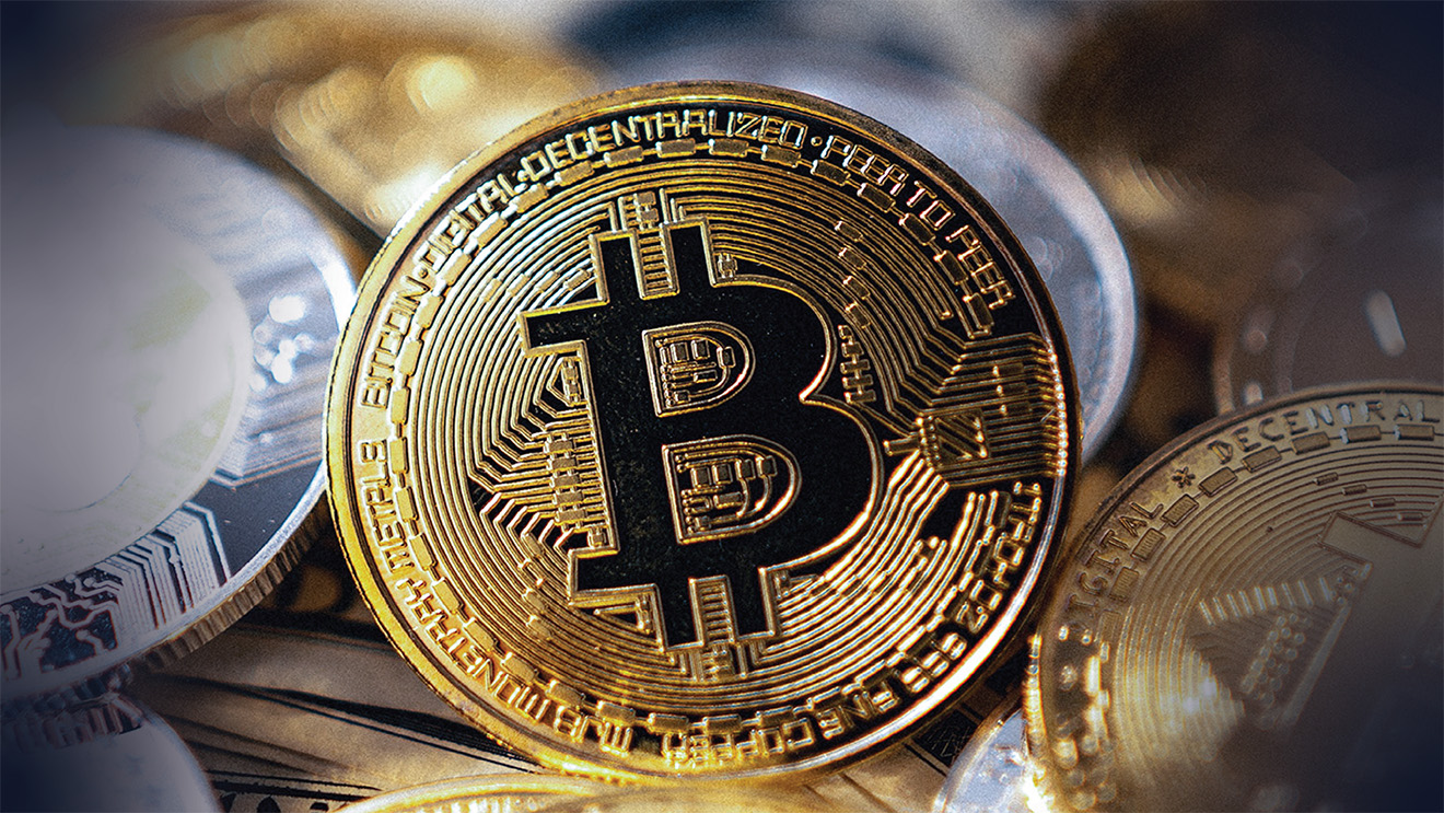 Image of gold coin representing cryptocurrency, surrounded by other silver coins