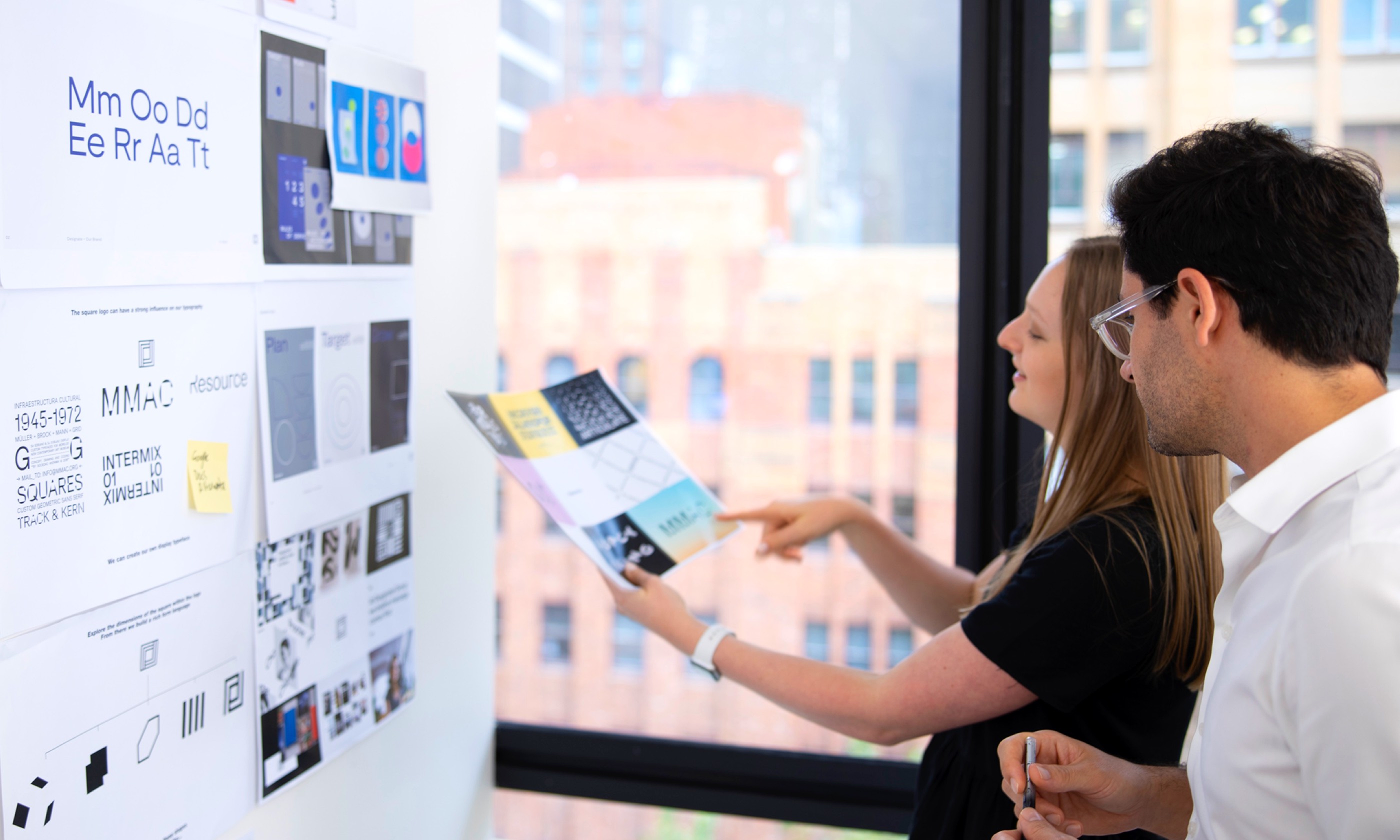 Designate team members discussing marketing strategy.