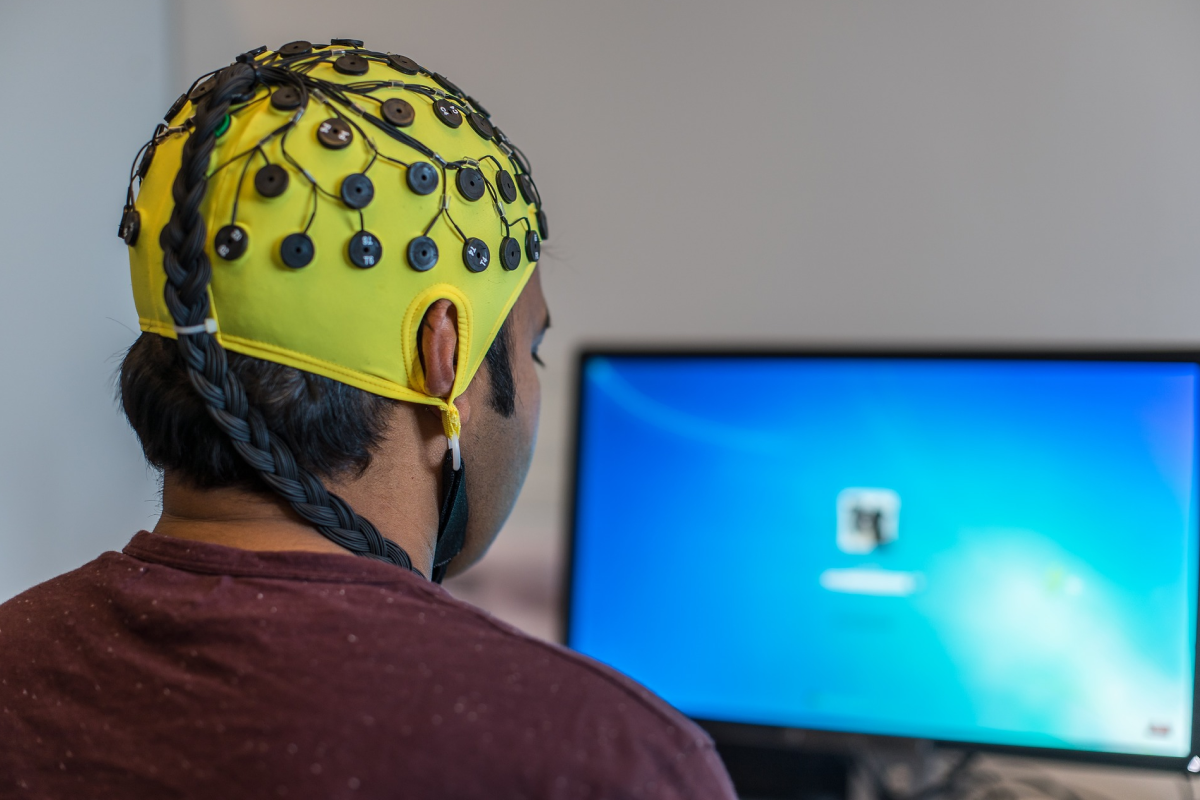 Man wearing common type of EEG headwear