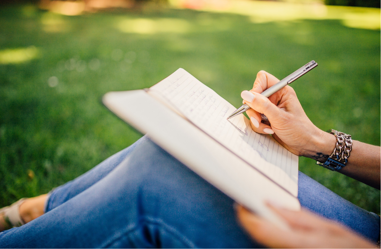 Writer with epilepsy writing in the park