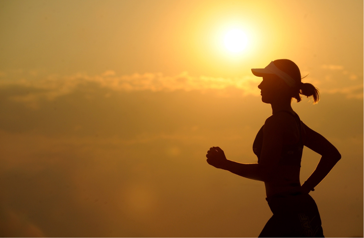 A woman doing exercise with epilepsy in the sun