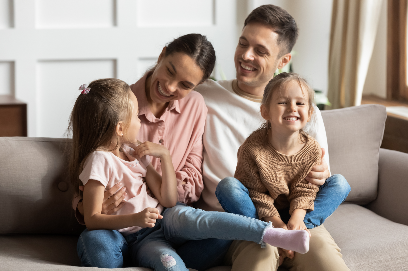 A smiling family with genetic epilepsy