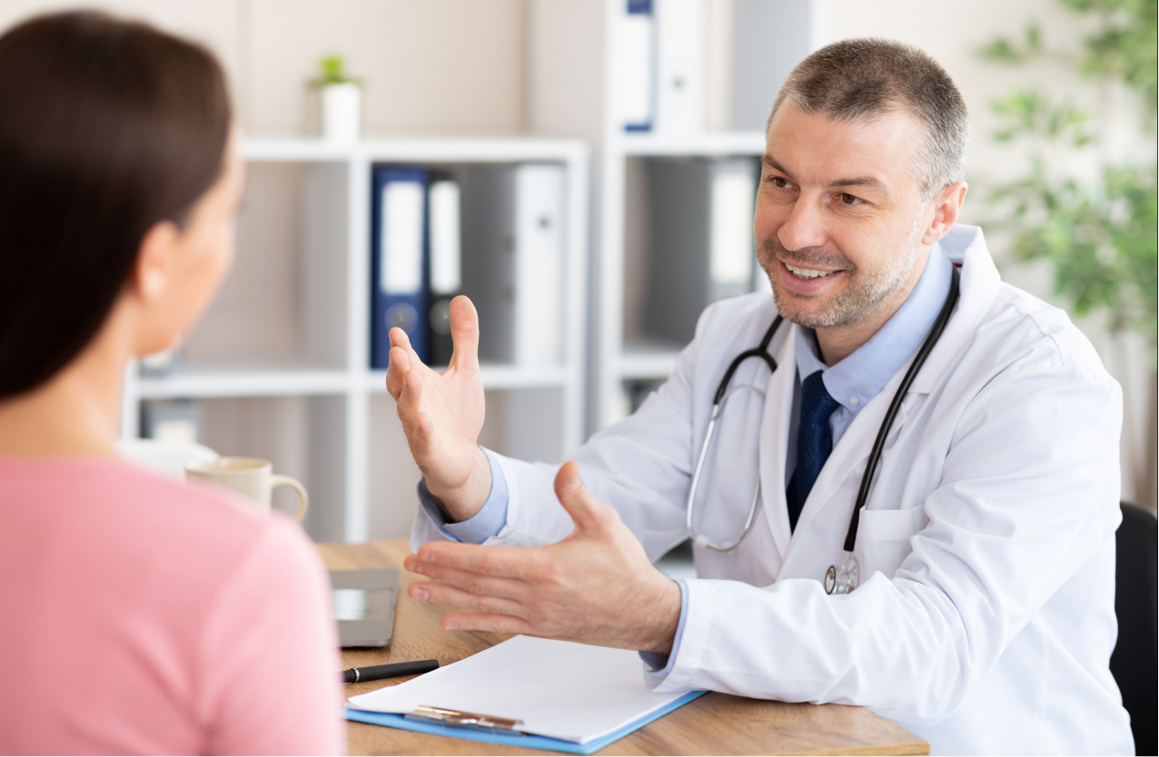 A doctor explains a diagnosis of epilepsy to his patient