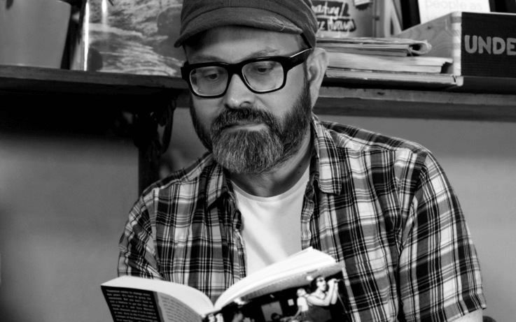 man reading a book