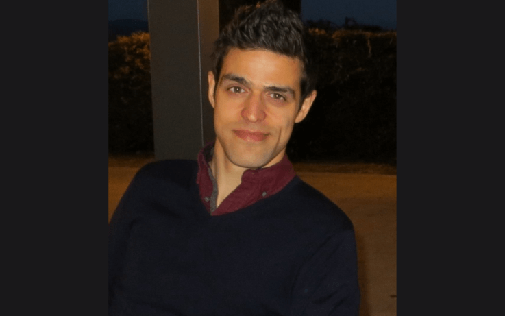 Man half smiling