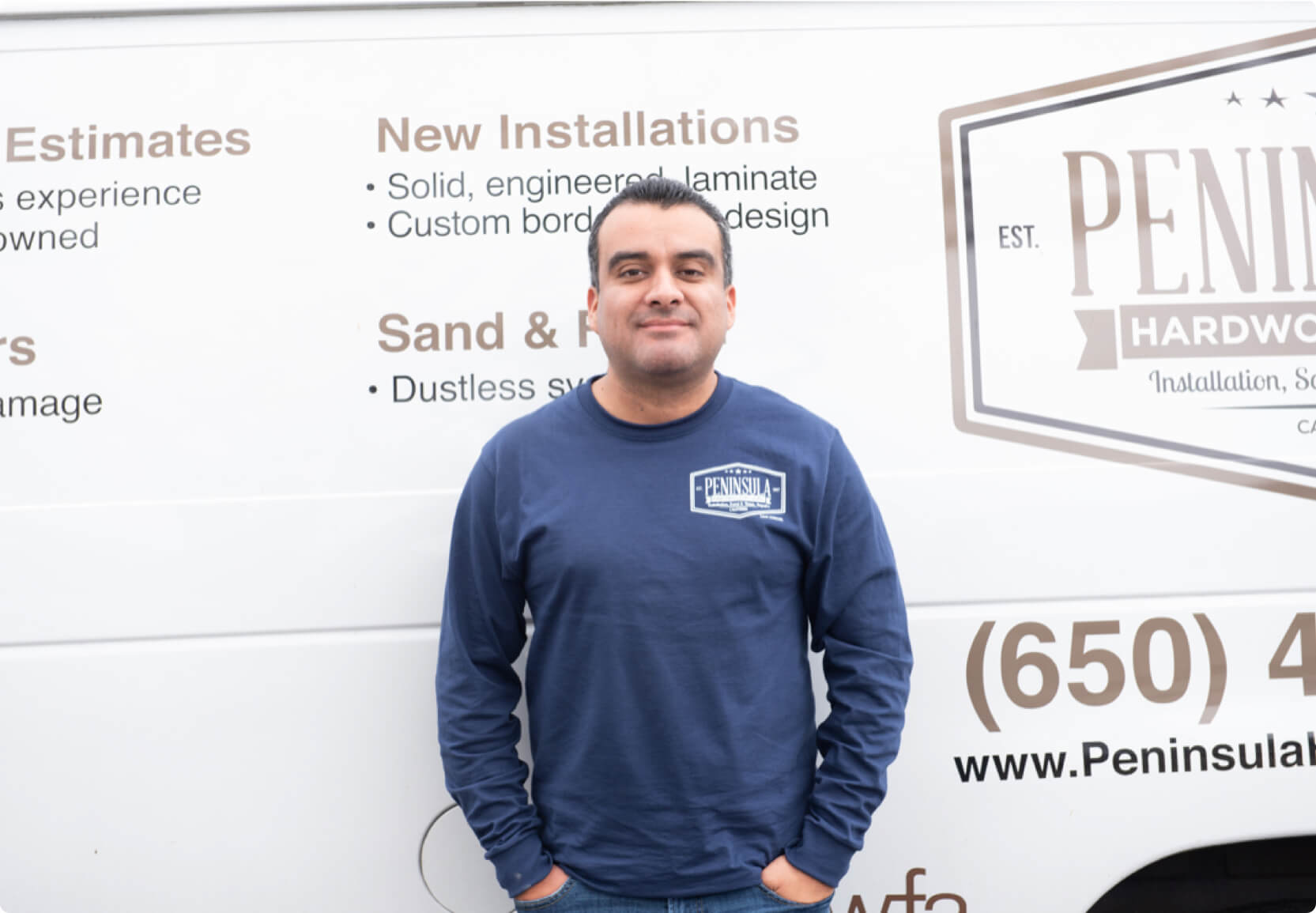 Hourly customer Joel Arias of Peninsula Hardwood Floors in front of their van