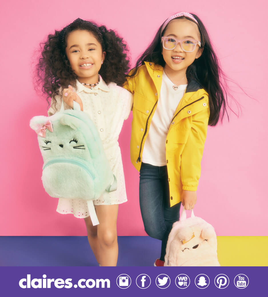 Two young girls with animal backpacks from Claire's