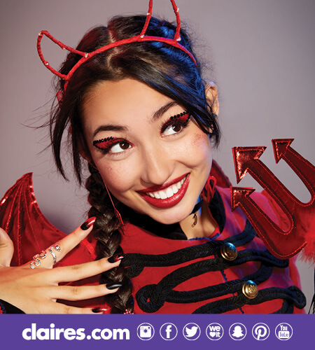 Teen girl wearing a Devil Costume