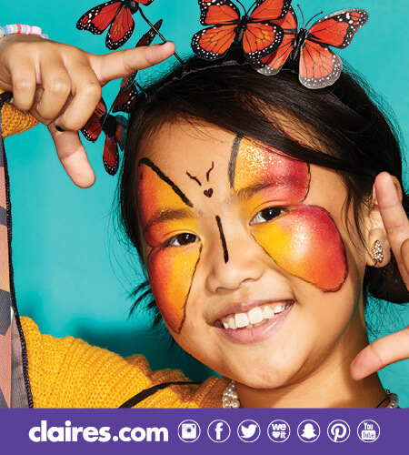 Young girl wearing a Monarch crown