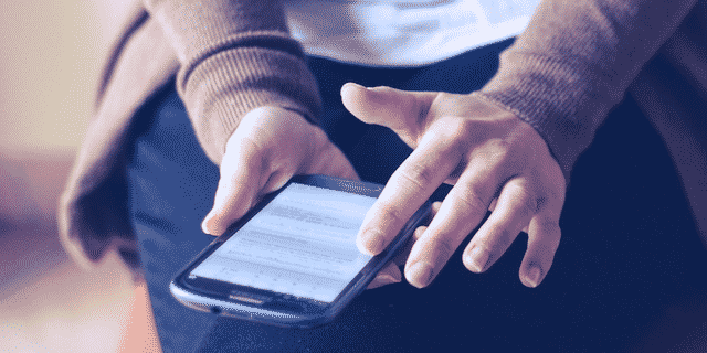 person using an app in a mobile device