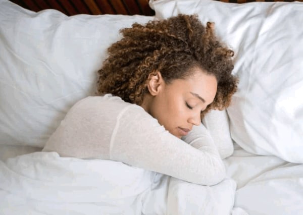 Female sleeping on side