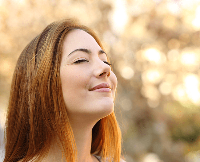 Woman enjoying deep breaths