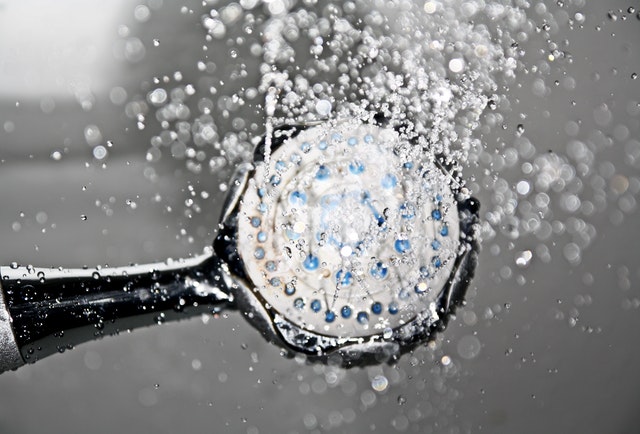 shower head spraying water