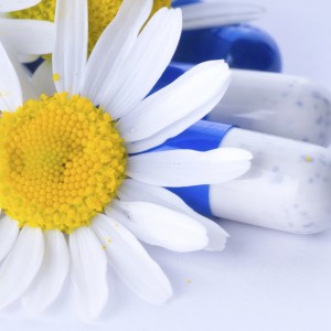 Tablets and flowers. Herbal medicine