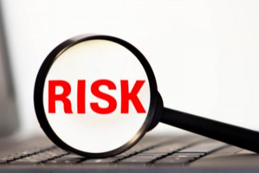 Risk in a magnifier