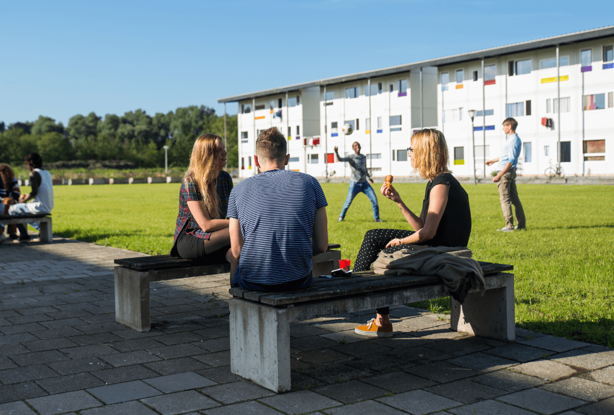 young people sitting outside