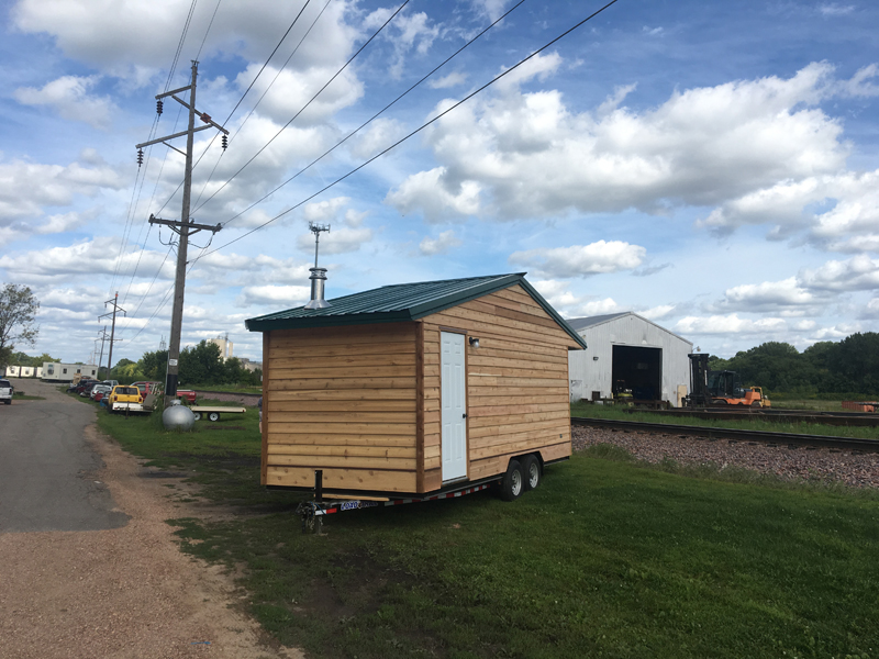 Mobile sauna in a patch of grass