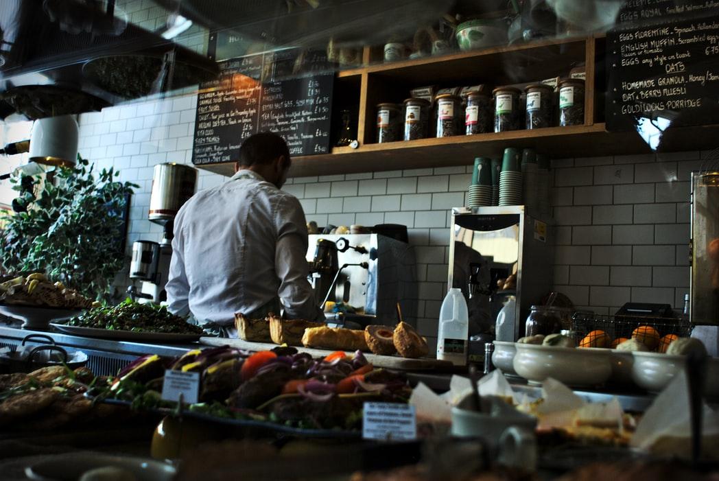 man-working-in-a-stocked-kitchen
