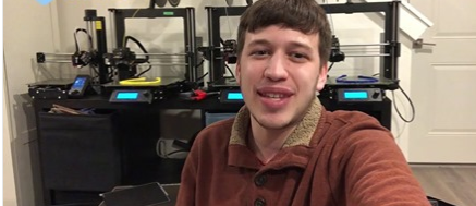 A person smiling for the cameraDescription automatically generated
