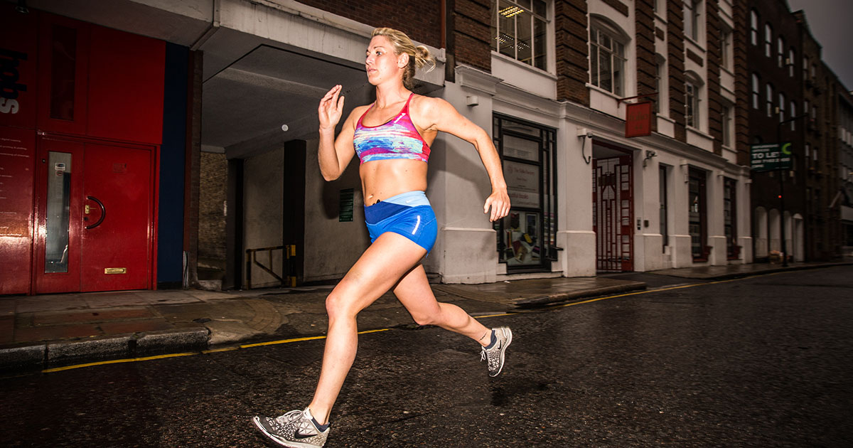 Liz Barker running through London