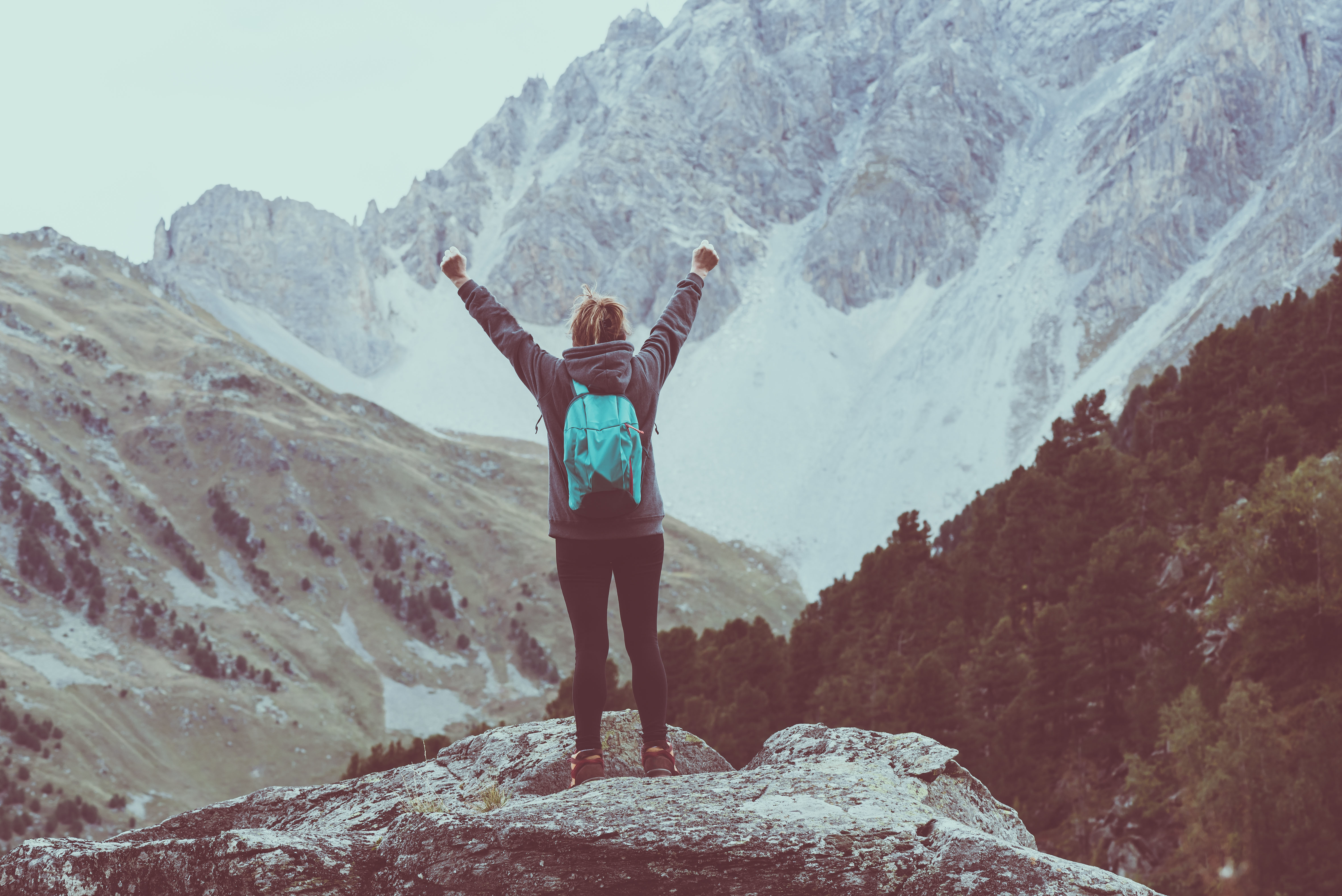 Women happy on life at top of mountain