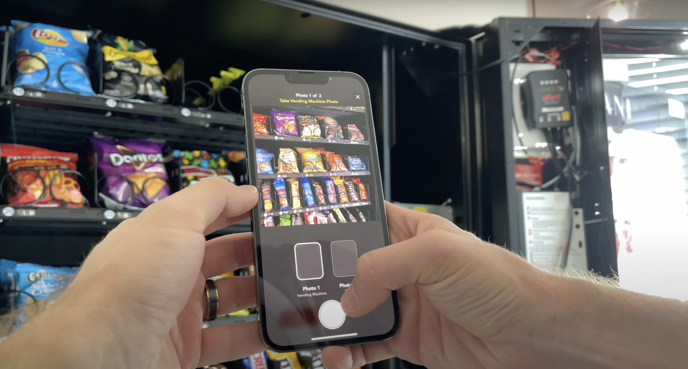 Gimme Field being used to take a picture of a snack vending machine planogram on an iPhone.