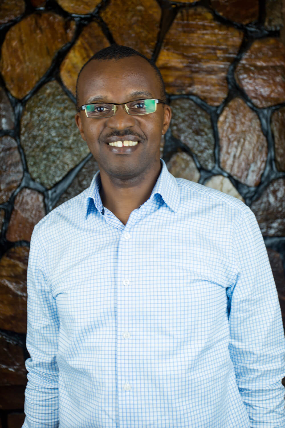 Michel Musilikare, Executive Director