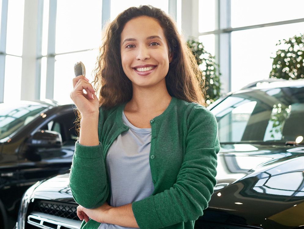 Woman holding car keys