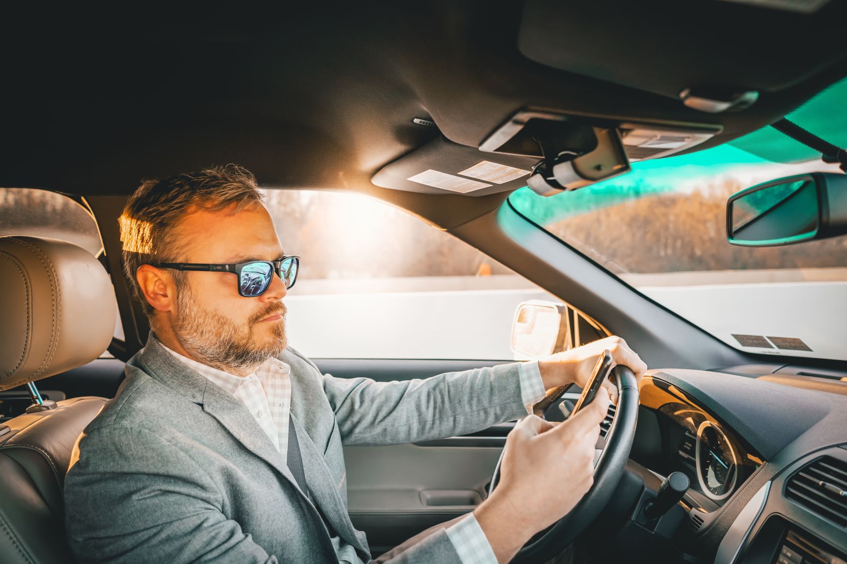Guy texting and driving