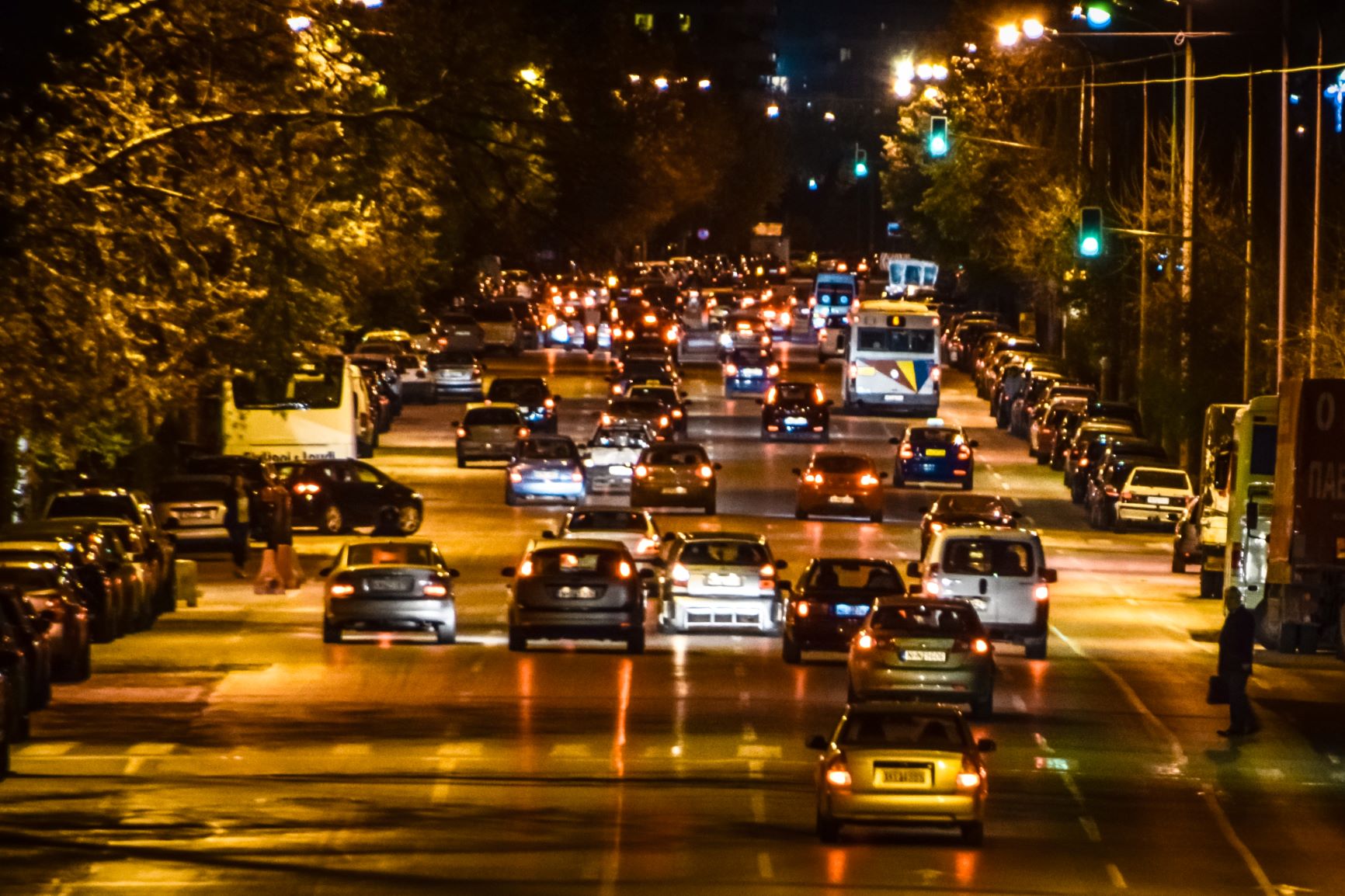 busy street at night in city