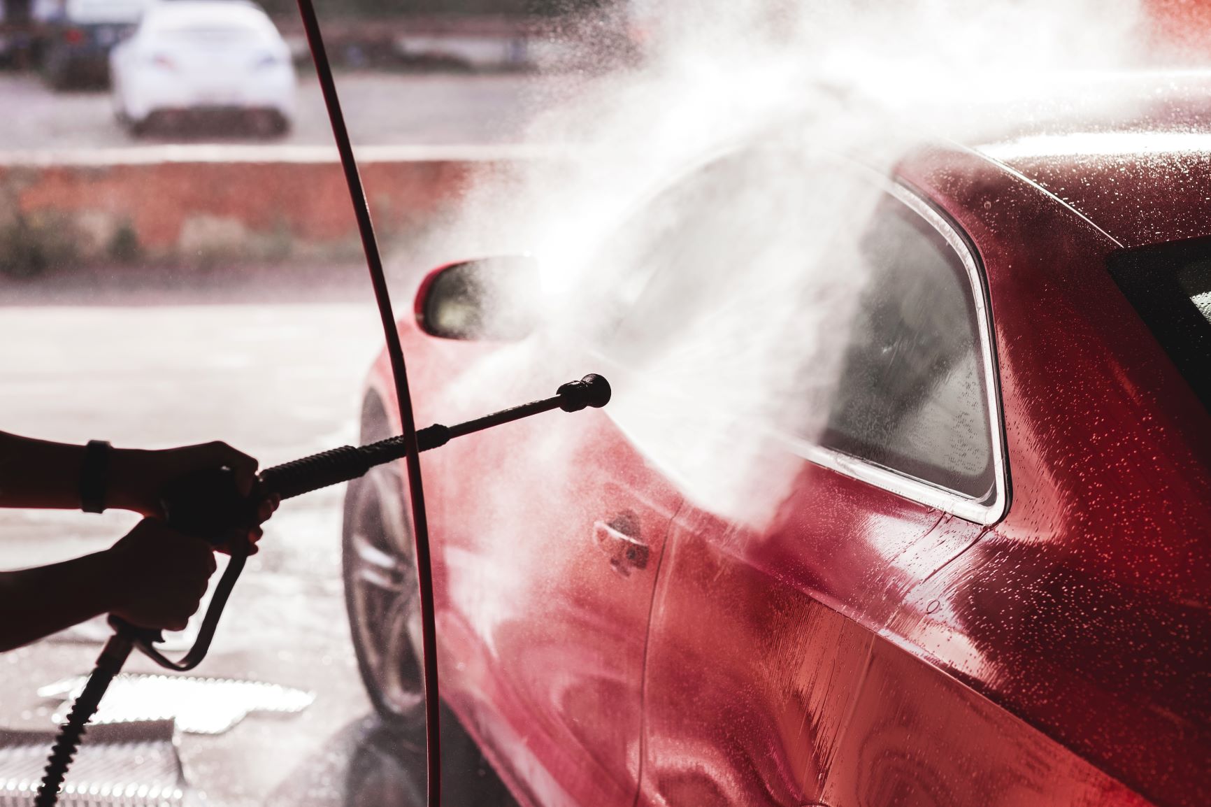 car washing a red sports car