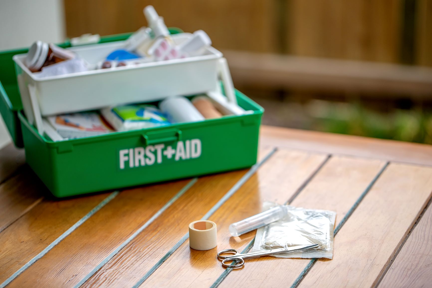 first aid kit on table