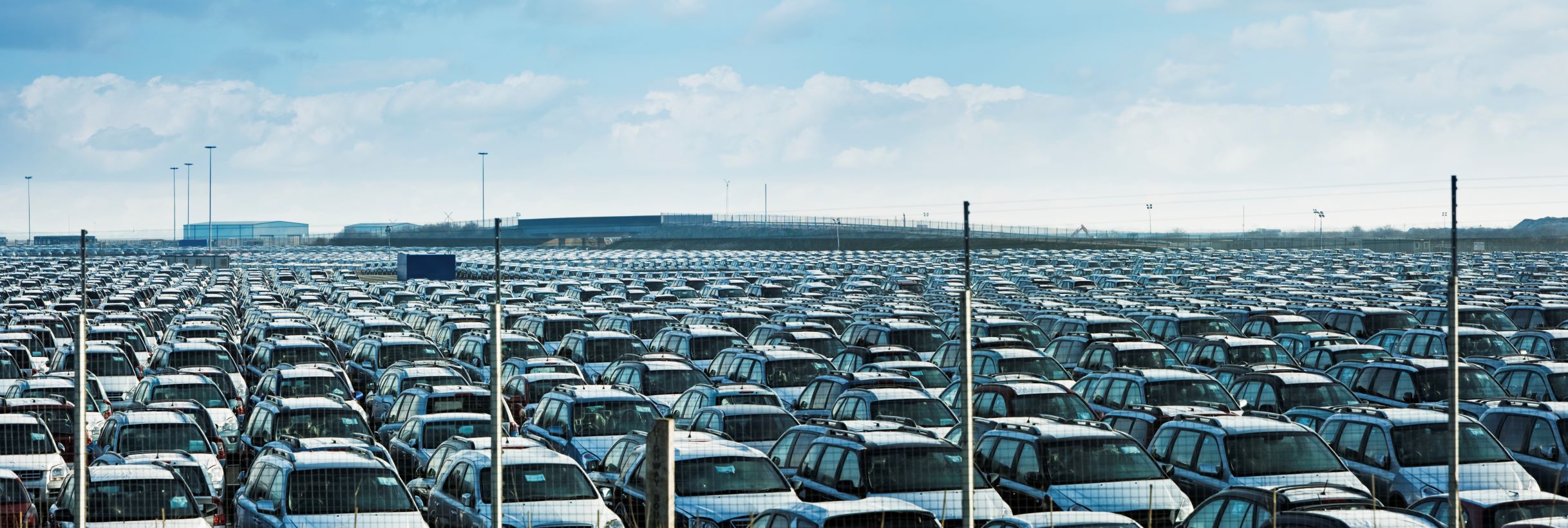new cars in a giant parking lot
