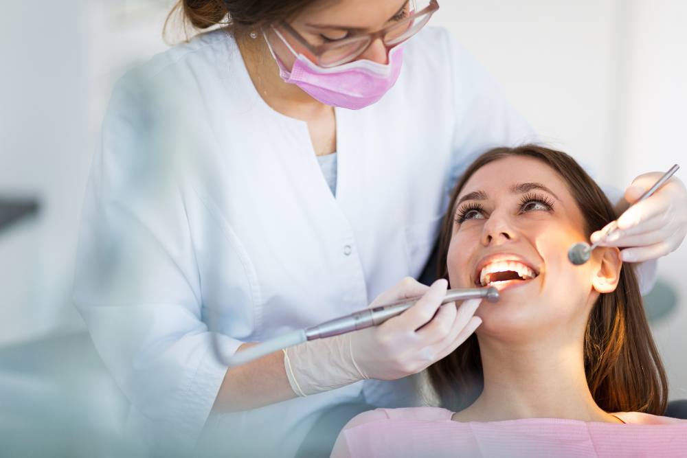 woman getting teeth checked