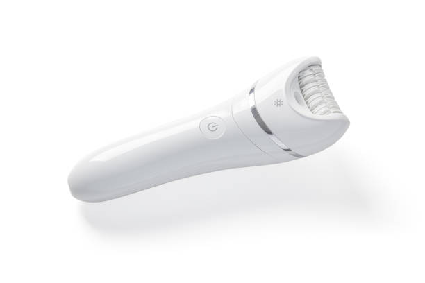 Epilator for women. Hair removal tool, machine. Shaving personal hygiene female accessories. Bathroom household devices. Modern epilator on white background. epilator stock pictures, royalty-free photos & images