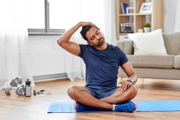 man training and stretching body at home stretch neck stock pictures, royalty-free photos & images