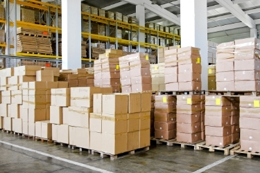 Pile of organized boxes inside a warehouse