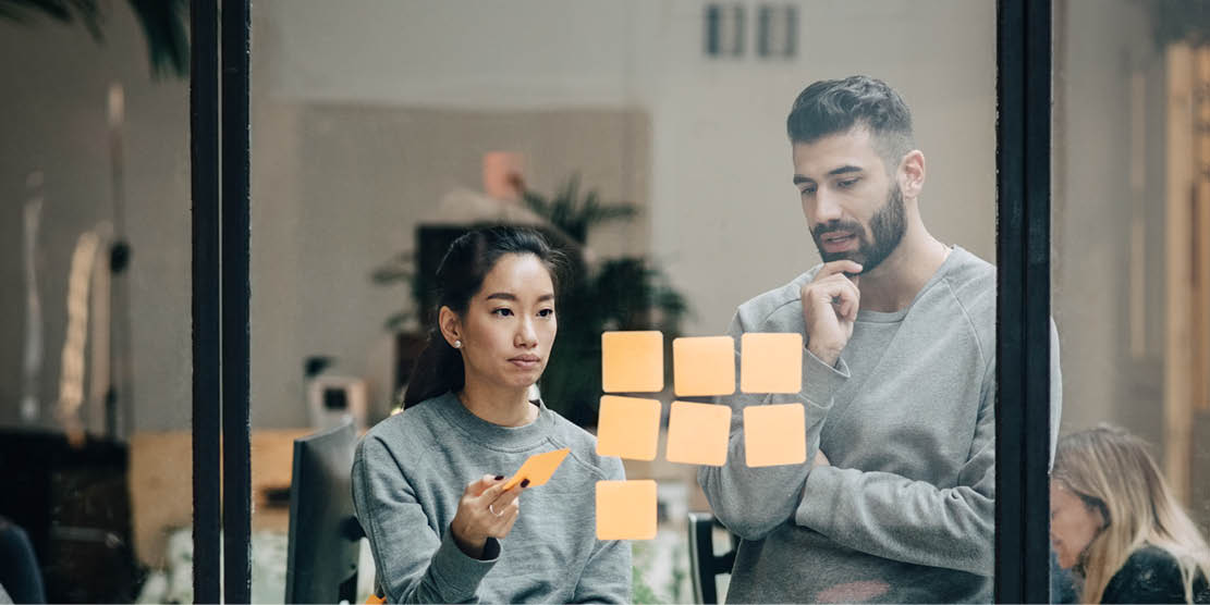 Marketing team brainstorms brand strategy