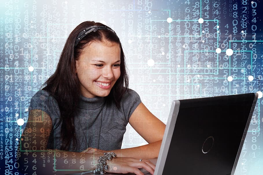 student operating a computer