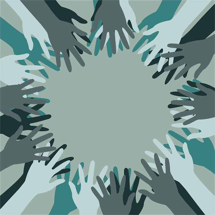 It takes <span class='ent _people'>people</span> of all shapes, sizes and colours to make a good team. The picture depicts many hands of different skin colours joining in a circle as a metaphor for <span class='ent _diversity'>diversity</span> and togetherness