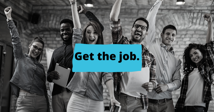 People standing in front of a sign that says "Get A Job".